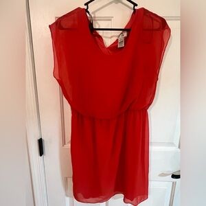 Super cute orange in color size large